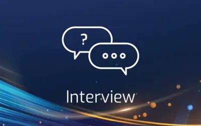 Graphic depicting conversation bubbles with "Interview" text, set against a vibrant blue background.