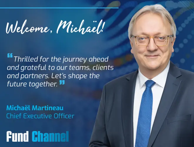 Michael Martineau, CEO, smiling in Amundi offices, focuses on investment management.future.