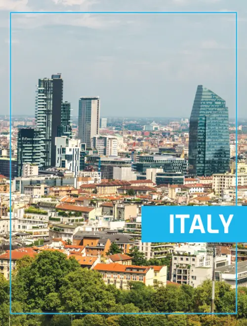A city skyline in Italy featuring modern buildings and urban landscape.