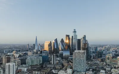 Skyline view of London, showcasing financial district buildings and investment opportunities.