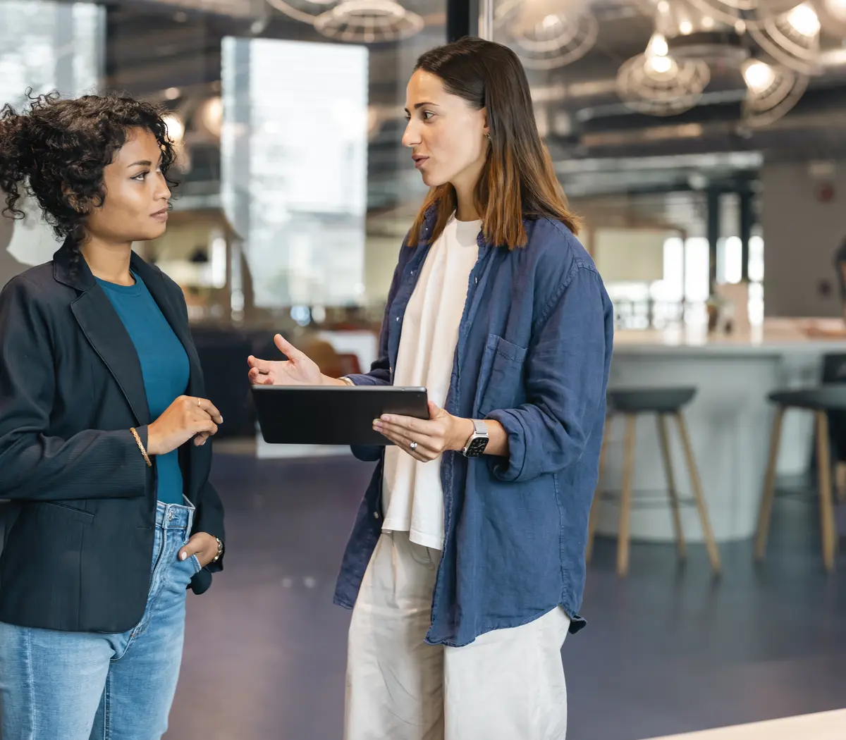 two_young_business_women_working_together
