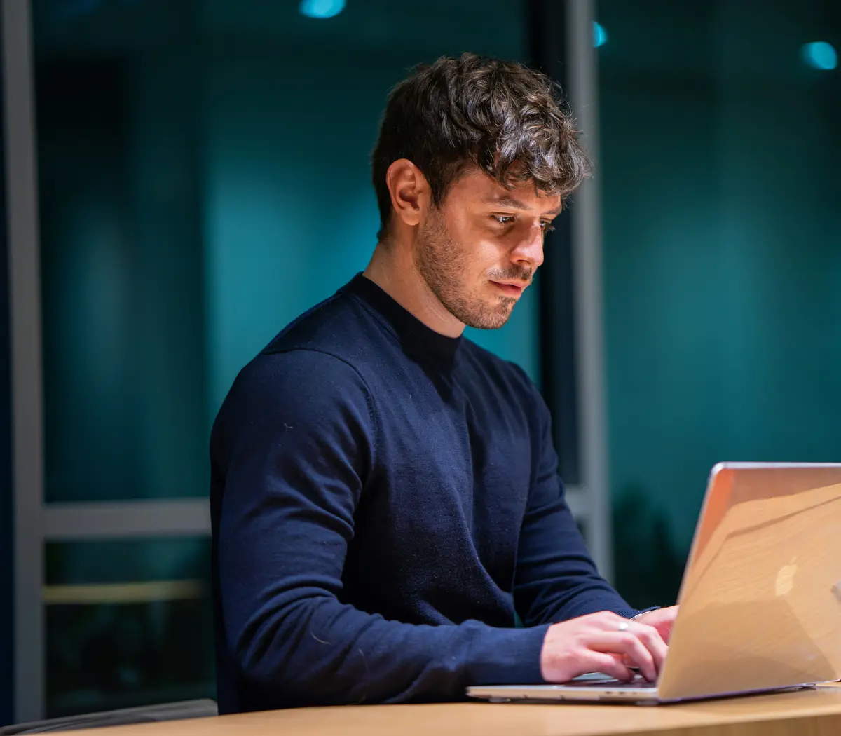 A man checking his laptop