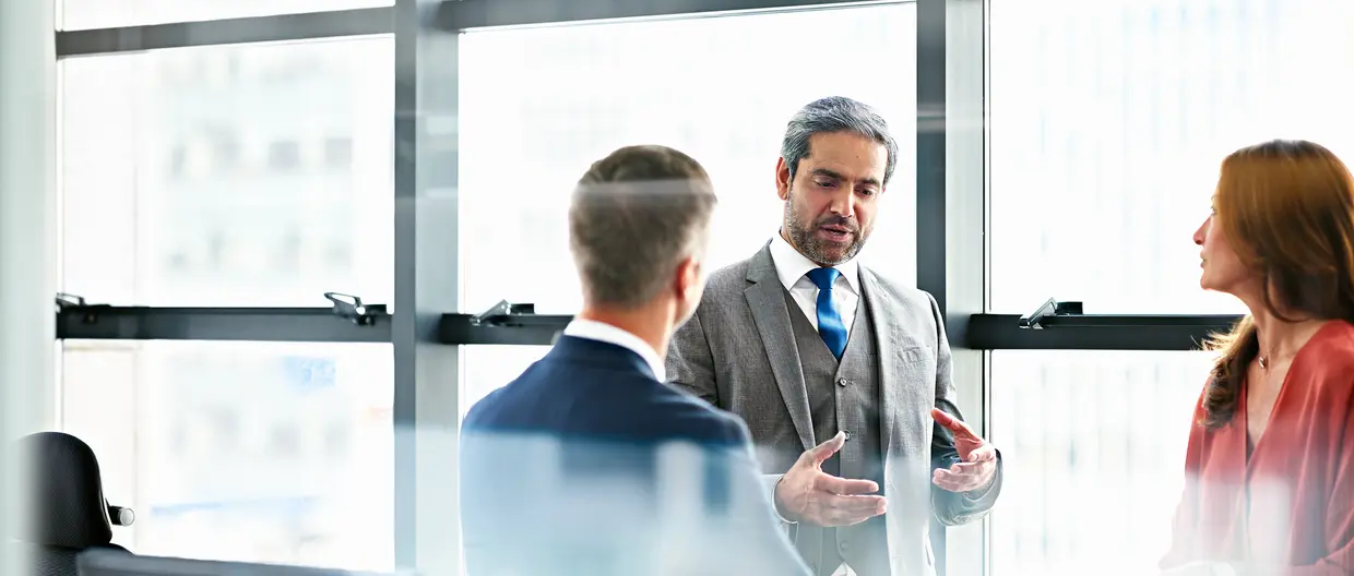 Coworkers discussing in the office