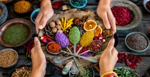 Various spices and dried fruits on the table.