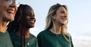 3 women looking in the distance